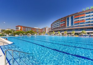 21.04 в хотел Lonicera Resort & Spa 5*, Алания, Турция! Автобусен транспорт + 7 нощувки на човек на база Ultra All Inclusive. Дете до 13.99г. безплатно!