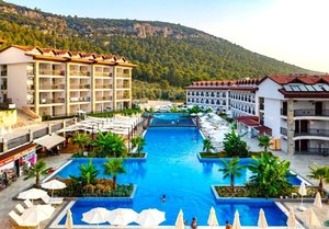 Почивка в Дидим, Турция: Транспорт + 7 All inclusive нощувки на човек + басейни и водни пързалки в RAMADA DIDIM BY WYNDHAM AKBUK 4*! Дете до 12.99 безплатно