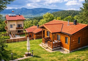 Почивка в Сапарева Баня: Нощувка със закуска за четири или шест възрастни + 2 деца от Миникомплекс Рилски тераси